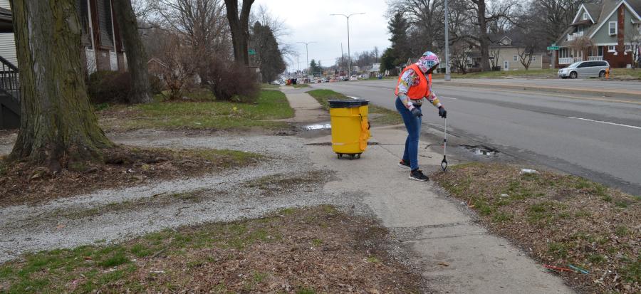 Image of a person cleaning Noland Road