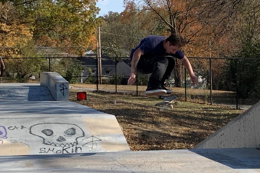 Skateboard jump and landing at Hill Park.