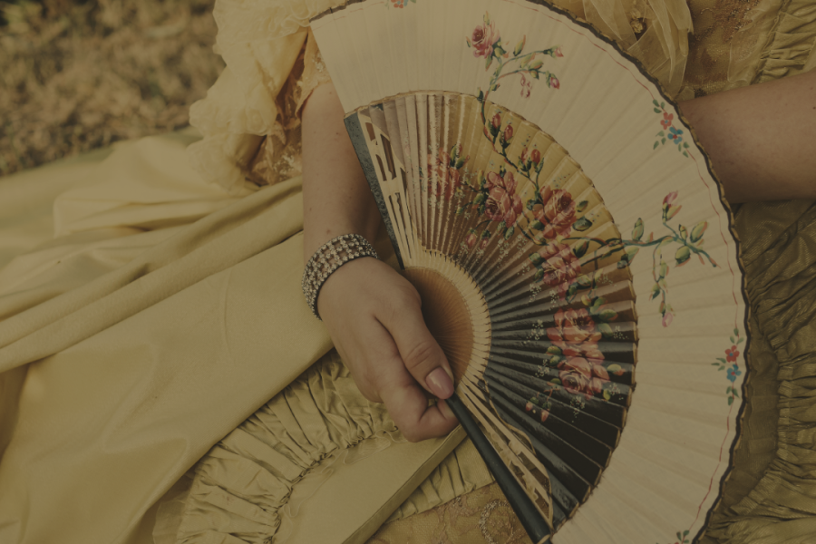 Image of a Victorian woman holding a fan