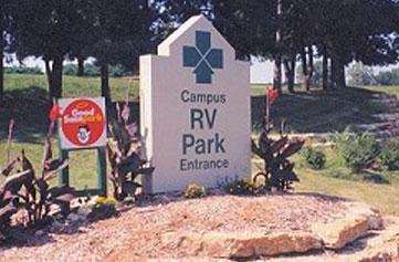 Image of the sign outside of Campus RV Park