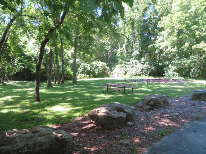 Tree shaded image of organized group camp area at George Owens Nature Park