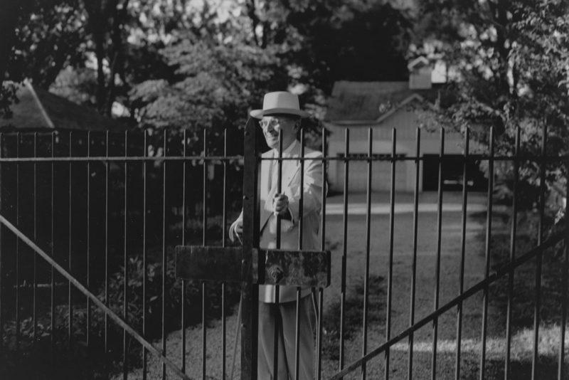 Truman at gate outside his home in Independence. Photo courtesy of Harry S. Truman Library & Museum