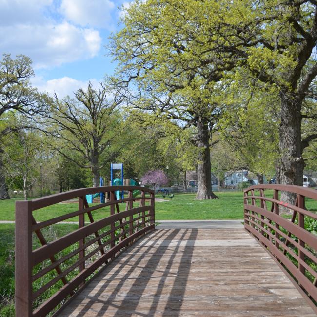 A bridge at the Country Club Park on a sunny day.