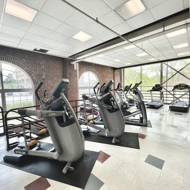 The Sermon Center cardio room with some fitness equipment.