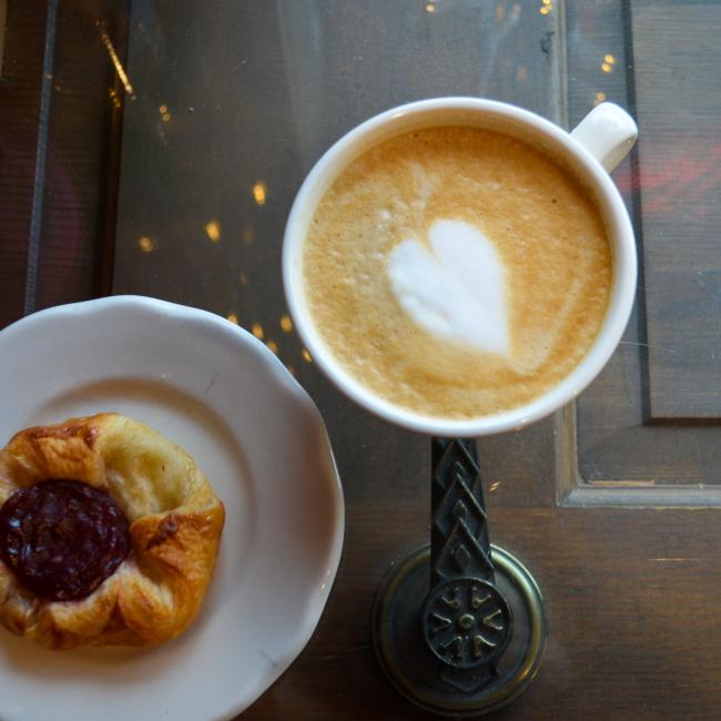 Image of coffee and pastry on table